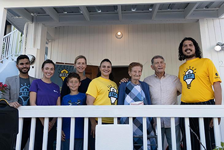 Viatris' Beth Medina helps welcome Juana Reyes and her son, Jose, home for the first time. ”“