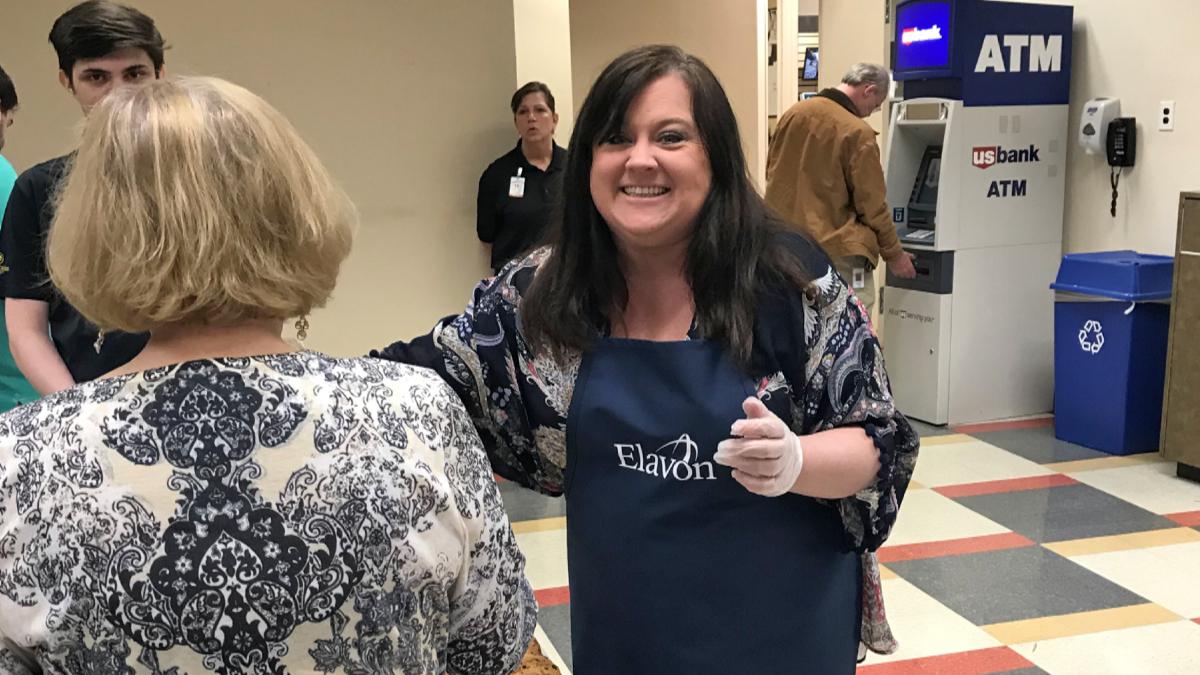 Joy Lyons stands ready to serve meals and her community. ”“